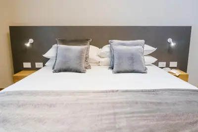 Letto o letti in una camera di ETNEA Suite 270