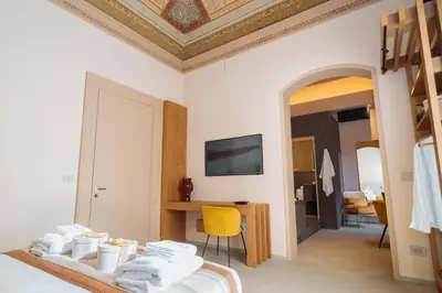 Letto o letti in una camera di ETNEA Suite 270