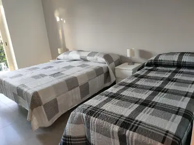 Letto o letti in una camera di Il giardino dell'Etna