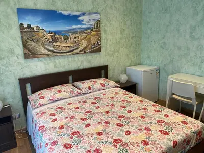 Letto o letti in una camera di B&B CATANIA CENTRO - Charme & More
