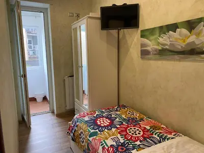 Letto o letti in una camera di B&B CATANIA CENTRO - Charme & More