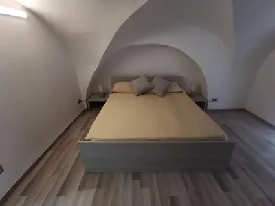 Letto o letti in una camera di Casa ninni nanni