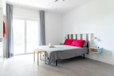 Letto o letti in una camera di NeveNera