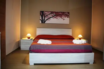 Letto o letti in una camera di Da Aloisia - Casa Vacanze