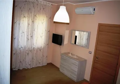 TV o dispositivi per l'intrattenimento presso Da Aloisia - Casa Vacanze