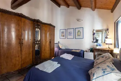 Letto o letti in una camera di Zefiro Rooms
