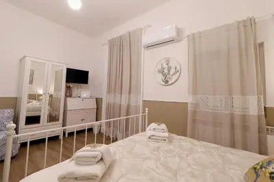 Letto o letti in una camera di CentroCittà Comfort