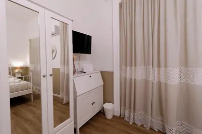 Letto o letti in una camera di CentroCittà Comfort