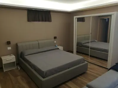 Letto o letti in una camera di Etna relax