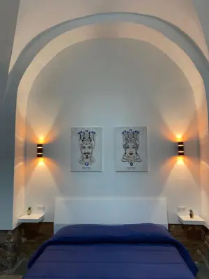 Letto o letti in una camera di Cortile Cerami Lux