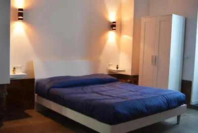 Letto o letti in una camera di Cortile Cerami Lux