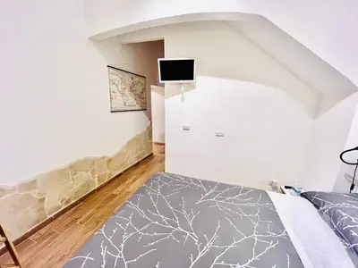 Letto o letti in una camera di Il Mondo