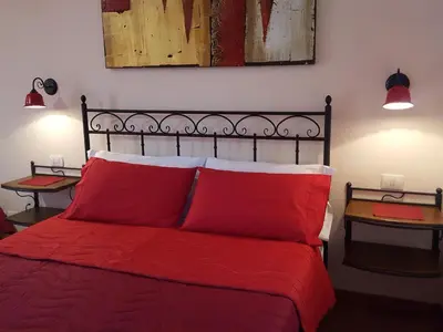 Letto o letti in una camera di Poggiofelice B&B