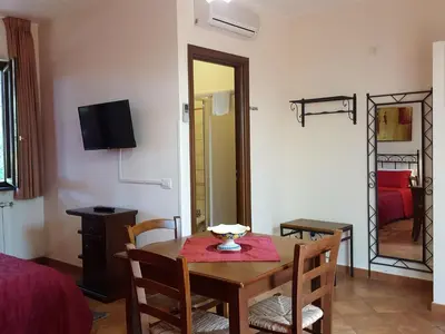 Letto o letti in una camera di Poggiofelice B&B