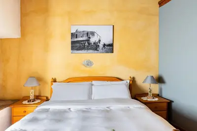 Letto o letti in una camera di Casa Etnea
