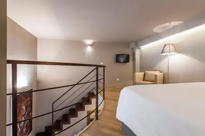 Letto o letti in una camera di Ferrini Home - Via Monte Sant'Agata