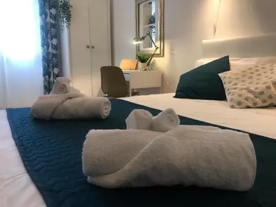 Letto o letti in una camera di Amurì