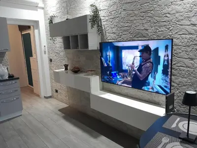 TV o dispositivi per l'intrattenimento presso Caronda House