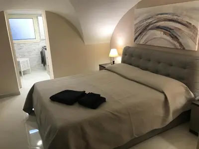 Letto o letti in una camera di Donizetti House