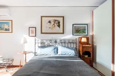 Letto o letti in una camera di GuestHost - Via Etnea Cozy Apartment with Balcony