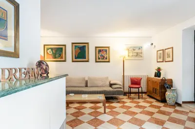 Area soggiorno di GuestHost - Via Etnea Cozy Apartment with Balcony