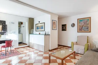 Area soggiorno di GuestHost - Via Etnea Cozy Apartment with Balcony