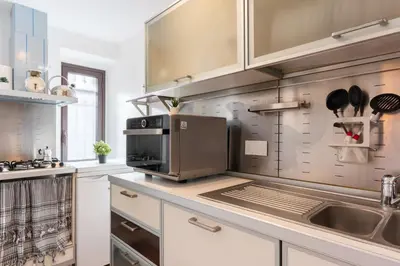 Cucina o angolo cottura di GuestHost - Via Etnea Cozy Apartment with Balcony