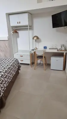 Letto o letti in una camera di Home Catania Dante Accommodations