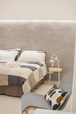 Letto o letti in una camera di Home Catania Dante Accommodations