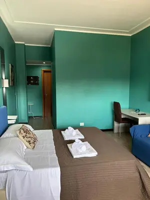 Letto o letti in una camera di Vivendo Rooms