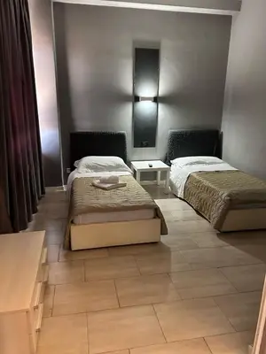 Letto o letti in una camera di Vivendo Rooms