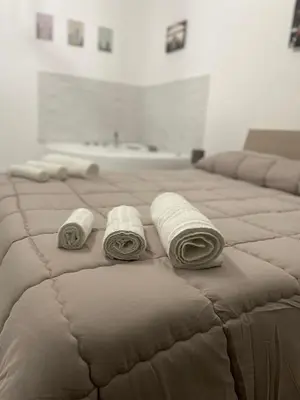 Letto o letti in una camera di Rosa Dei Venti Apartment