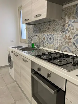 Cucina o angolo cottura di Rosa Dei Venti Apartment