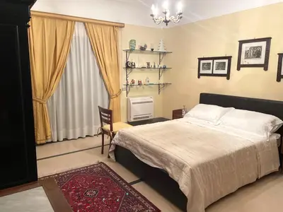 Letto o letti in una camera di CESARE'S HOME