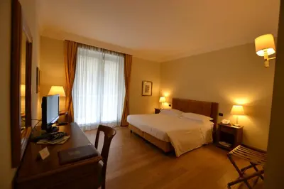 Letto o letti in una camera di Katane Palace Hotel