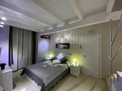 Letto o letti in una camera di Bnb Archimede