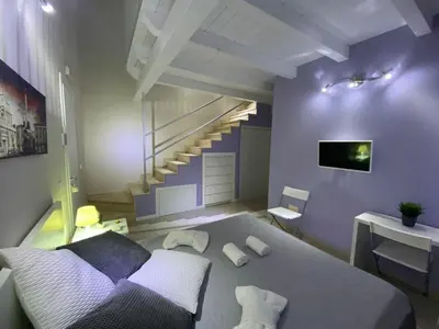 Letto o letti in una camera di Bnb Archimede