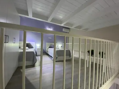 Letto o letti in una camera di Bnb Archimede