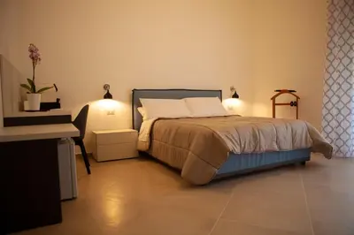 Letto o letti in una camera di CasaPaola b&b Rooms