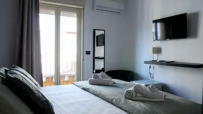 Letto o letti in una camera di B&B Filo 15
