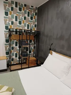 Letto o letti in una camera di B&B Filo 15