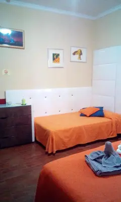Letto o letti in una camera di Villa Morgante B&B