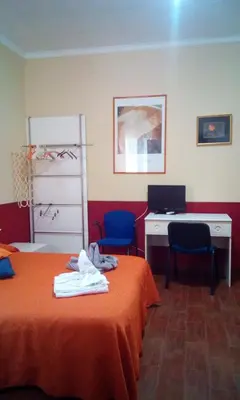 Letto o letti in una camera di Villa Morgante B&B