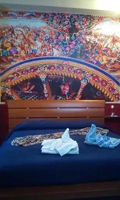 Letto o letti in una camera di Villa Morgante B&B