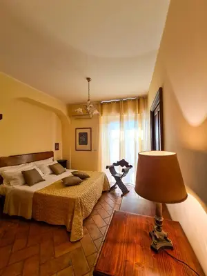 Letto o letti in una camera di VILLA PANORAMICA DELL'ETNA