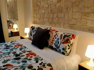 Letto o letti in una camera di Casa vacanza Il Mandarino