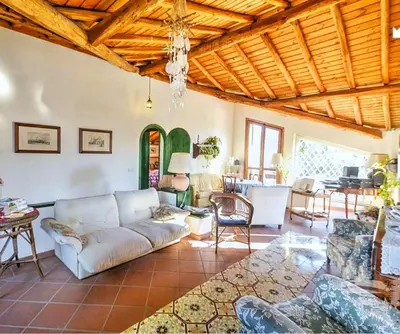 Area soggiorno di B&B La Casa del Ficus
