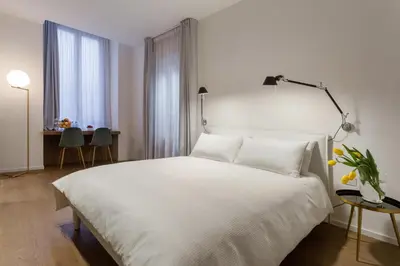 Letto o letti in una camera di Holiday gagliani