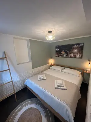 Letto o letti in una camera di Amuri di casa Scogliera