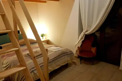 Letto o letti in una camera di A casa di Rudy